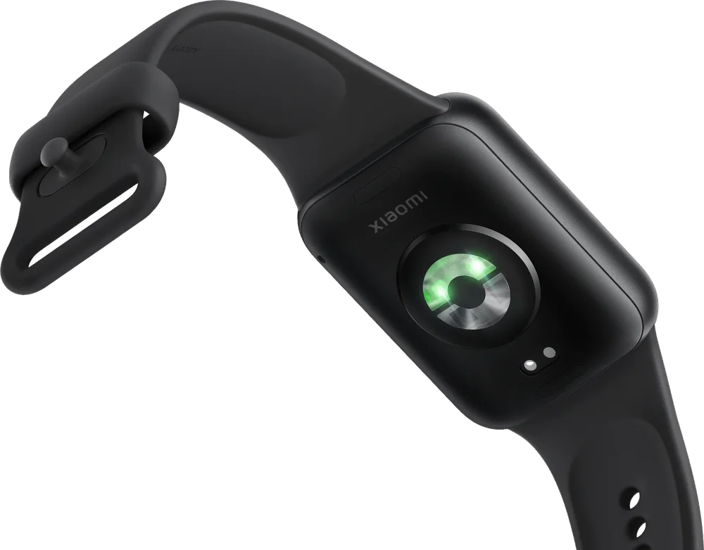 Pulsera de actividad de Xiaomi vista por detrás, con el sensor óptico de pulso encendido en verde